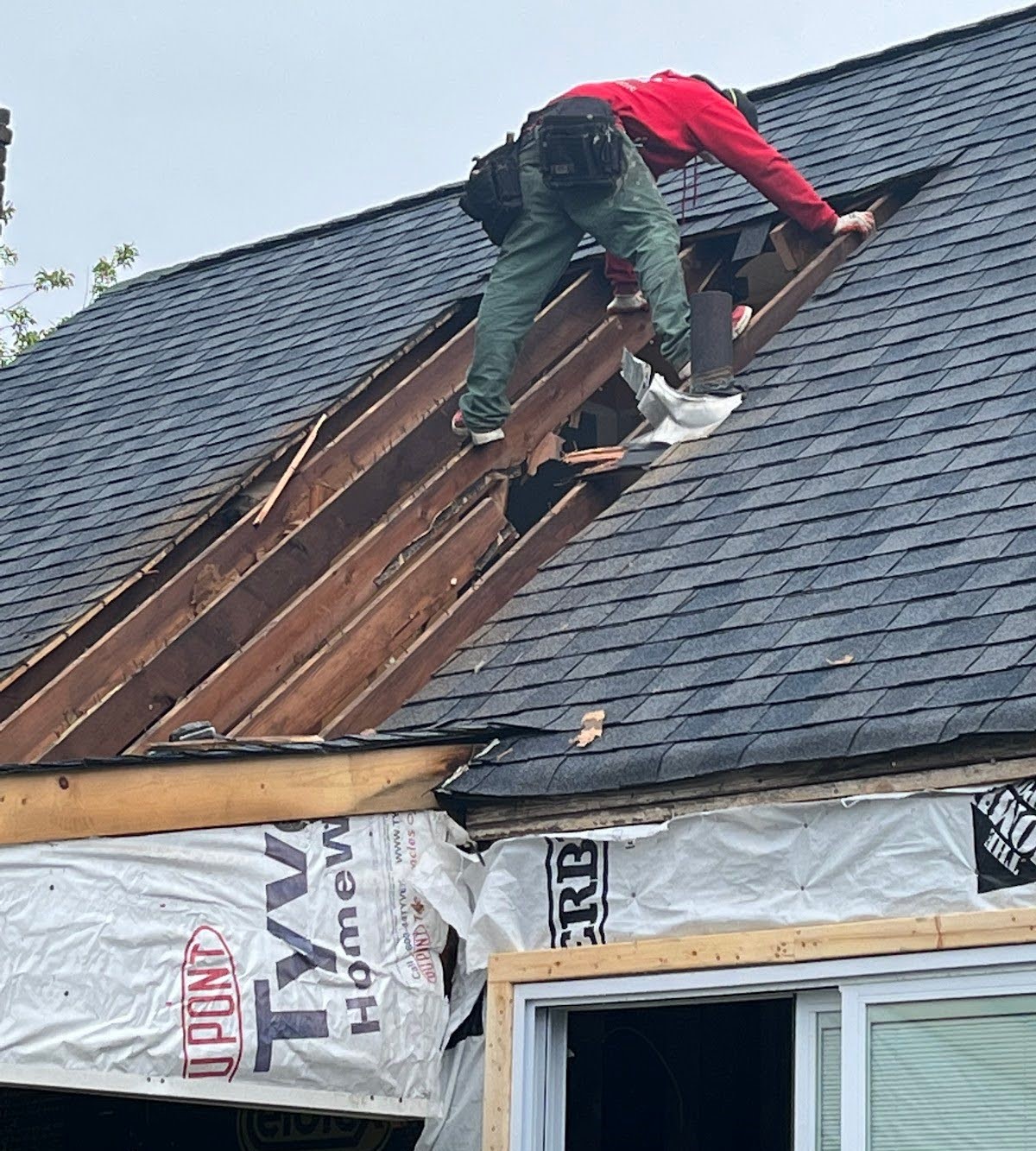 Handyman repairing a home at Massachusetts